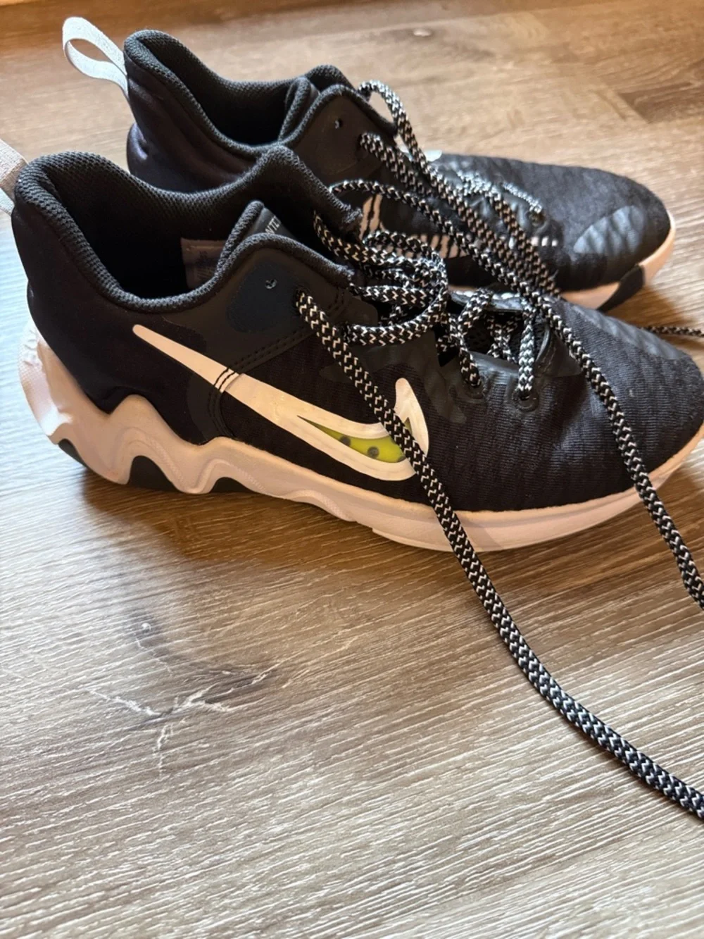 Nike Black and White Running Shoes with Lime Swoosh Accents